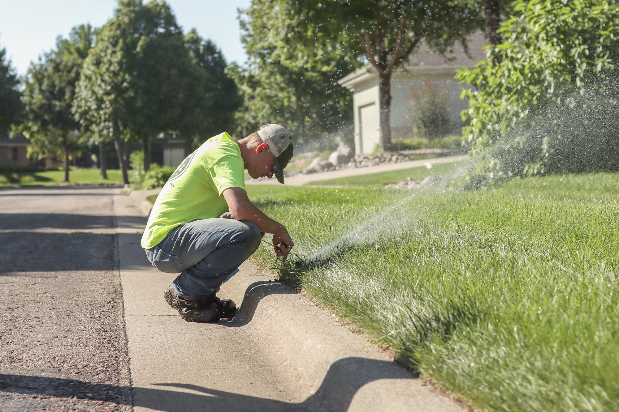Watering The Grass And Sprinkler Heads Image Via Landscape Garden Centers